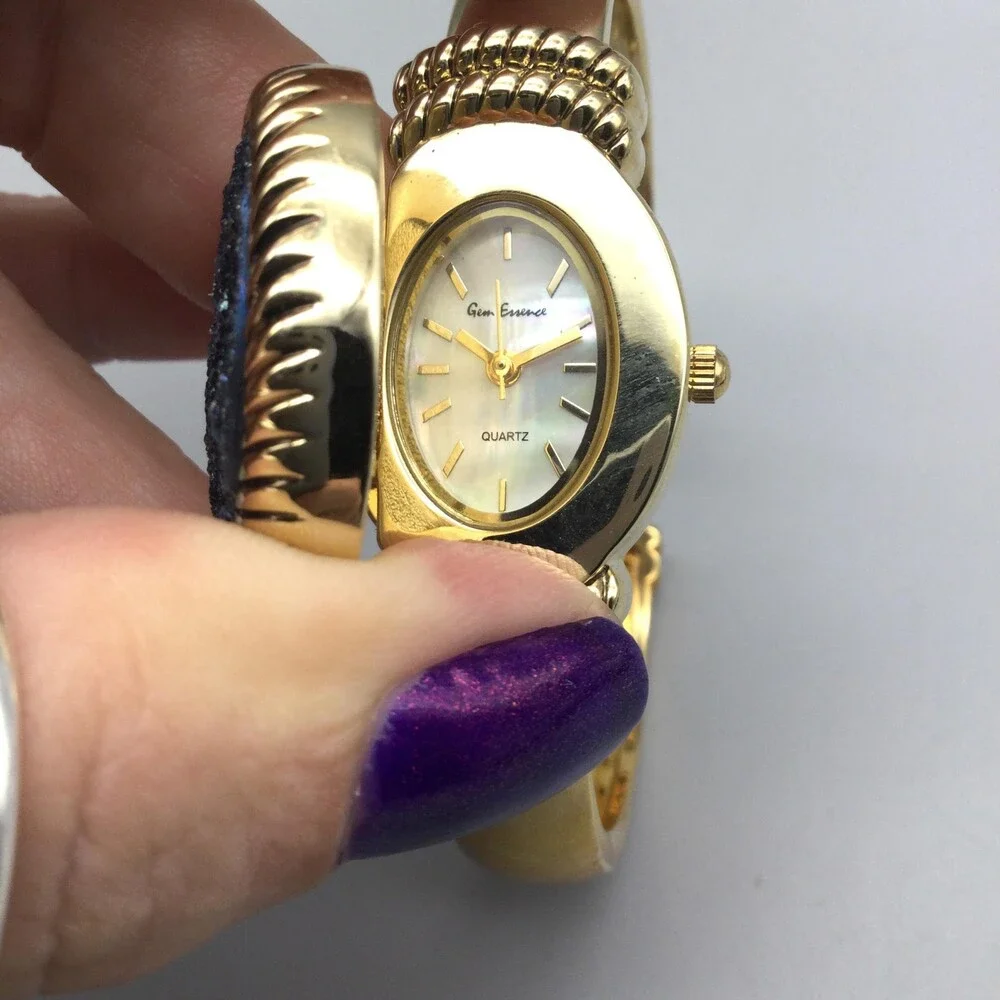 Gem Essence Womens Watch 22mm MOP Gold Tone Bangle Blue Cover B8505 New Battery